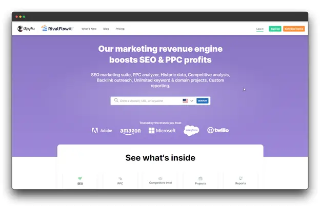 SpyFu website homepage. The website promotes itself as a tool for boosting SEO and PPC profits. It offers features like SEO marketing, PPC analysis, competitive analysis, and backlink outreach. The homepage has a search bar where users can enter a domain or URL to analyze.